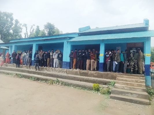 Glimpse of Voters standing in long queue at GHSS Bupp waiting for their turn to cast vote in General Election Lok Sabha 2024 (First Phase).